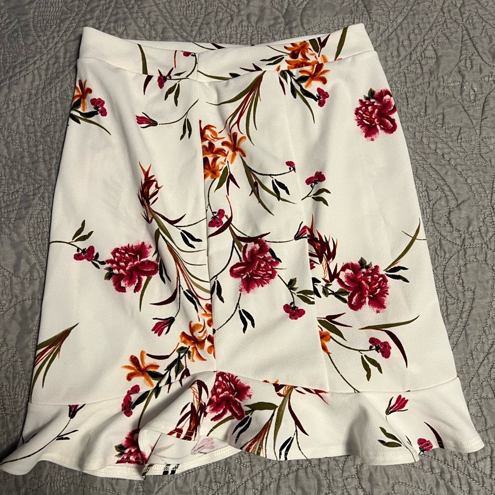 Lucy in the Sky floral skirt. No tag but fits like a small